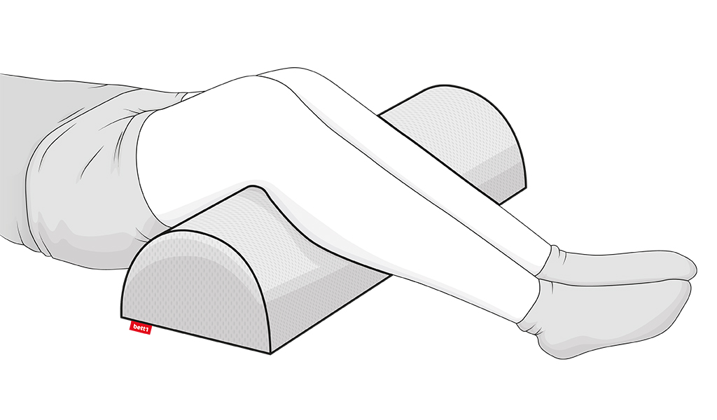 Illustration : 2 jambes posées sur un traversin demi-lune BODYGUARD